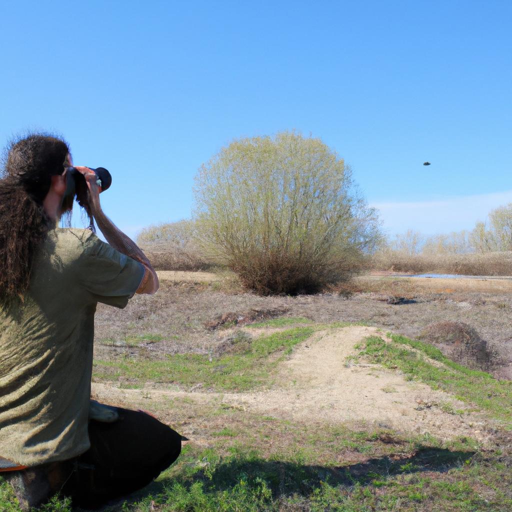 Photographer observing birds in nature